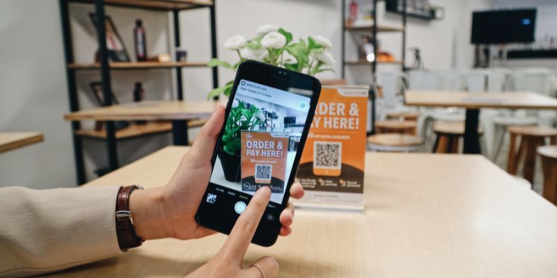 A customer scanning a QR code
